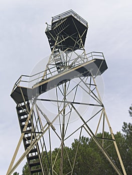 Old rusty steel forest fire lookout tower.