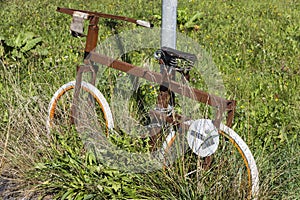 Old rusty, strange, funny bicycle