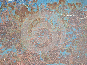 Old rusty surface. Scratched metal painted metal background. Dirty and Old metal texture background. Metal wallwith peeling pain