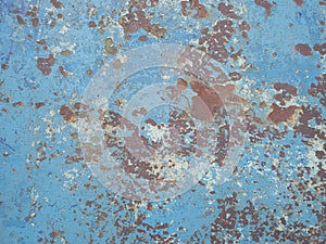 Old rusty surface. Scratched metal painted metal background. Dirty and Old metal texture background. Metal wallwith peeling pain