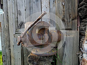 Old rusty table vises for handwork on metal