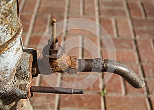 Old rusty tap column