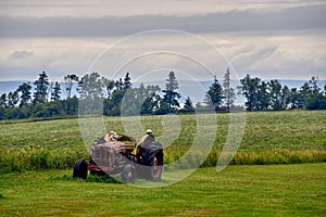 Old rusty tractor in a field, Atlantic Canada