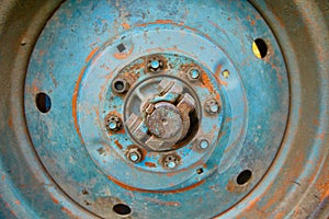 old rusty tractor wheel close up