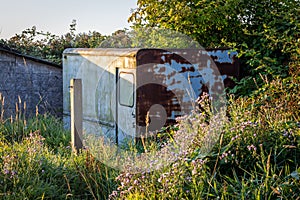 Old Rusty Trailer in the field