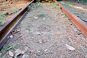 Old and rusty train rails in disuse