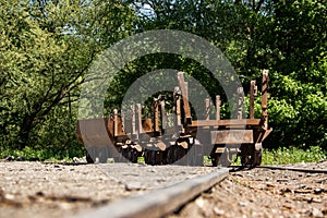 Old rusty train wagon forever parked at an abandoned railway station