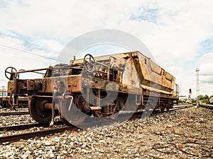 Old rusty train wagons on railway