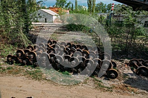 Old rusty train wheels in abandoned factory