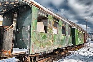 Old rusty Train in Winter in abandoned Railway station