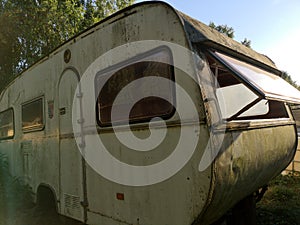 old rusty travel trailer. camper van, caravan