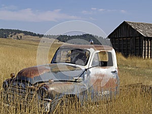 Old Rusty Truck and Building