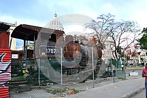 Old and rusty vintage train wagons dating back from the communist era in Havana, Cuba