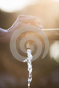 Old rusty water tap in garden