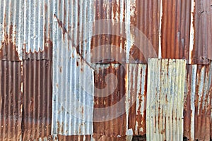 Old rusty zinc sheet wall or aged rust iron barn background