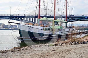 Old sail ship in front of a bridge near Mainz city