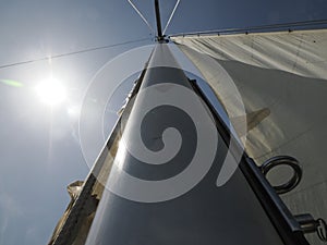 old sailboat sheet winch sail detail Yachting. Sailing winch and rope of a yacht. Sheet. Cable. pulley