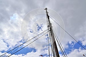 Old sailing boat mast and rope at the port of Kiel on a sunny day