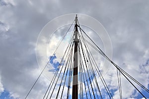 Old sailing boat mast and rope at the port of Kiel on a sunny day