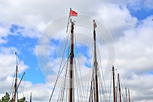 Old sailing boat mast and rope at the port of Kiel on a sunny day