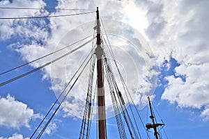 Old sailing boat mast and rope at the port of Kiel on a sunny day