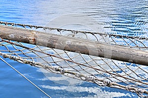 Old sailing boat mast and rope at the port of Kiel on a sunny day