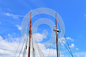 Old sailing boat mast and rope at the port of Kiel on a sunny day