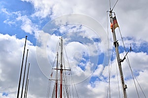 Old sailing boat mast and rope at the port of Kiel on a sunny day