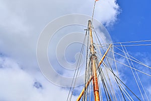 Old sailing boat mast and rope at the port of Kiel on a sunny day