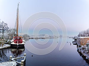 Old sailing boat in a psychedelic sunrise