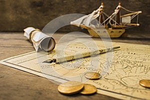 Old sailing ship model and objects over a captainÃÂ´s cabin