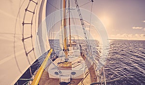 Old sailing ship at sunset