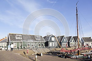 Old sailing vessel in harbor of dutch village Marken