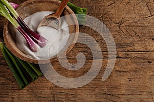 Old salt box with green onions