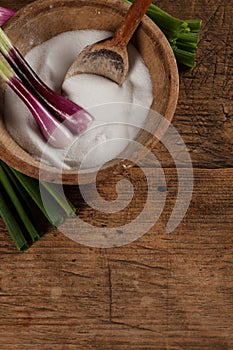 Old salt box and spoon with onions