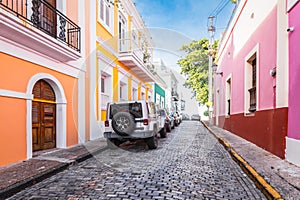 Old San Juan city with colorful houses and cobblestone street.