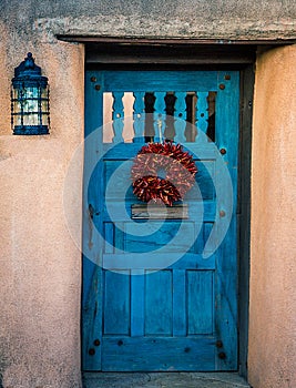 Old Santa fe door in deep blue colors