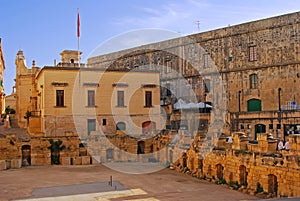 The old scene of current Royal Opera House site with Our Lady Of Victories Chapel behind at South Street, Valletta, Malta