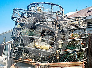 Old school Crab pots in the bed of an old white truck  in Bodega Bay, California, Tough truck meant to last