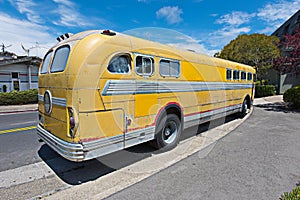 Old schools bus parked on the side of road