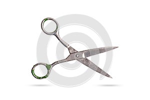 Old scissors isolated on a white background