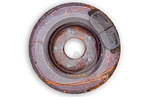 Old scored rusty brake rotor and pads