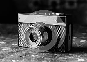 Old scratched vintage camera