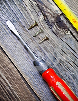 Old screwdriver and screws