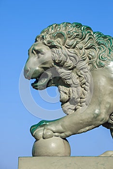 Old sculpture of a lion at the Palace pier. Saint Petersburg photo