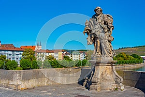 Old sculpture at Mainbrucke in Wurzburg in Germany photo
