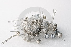 Old semiconductor transistors from Soviet technology on a white background