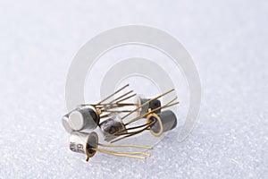 Old semiconductor transistors from Soviet technology on a white background
