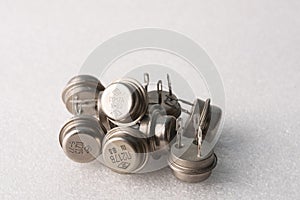 Old semiconductor transistors from Soviet technology on a white background