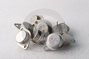 Old semiconductor transistors from Soviet technology on a white background